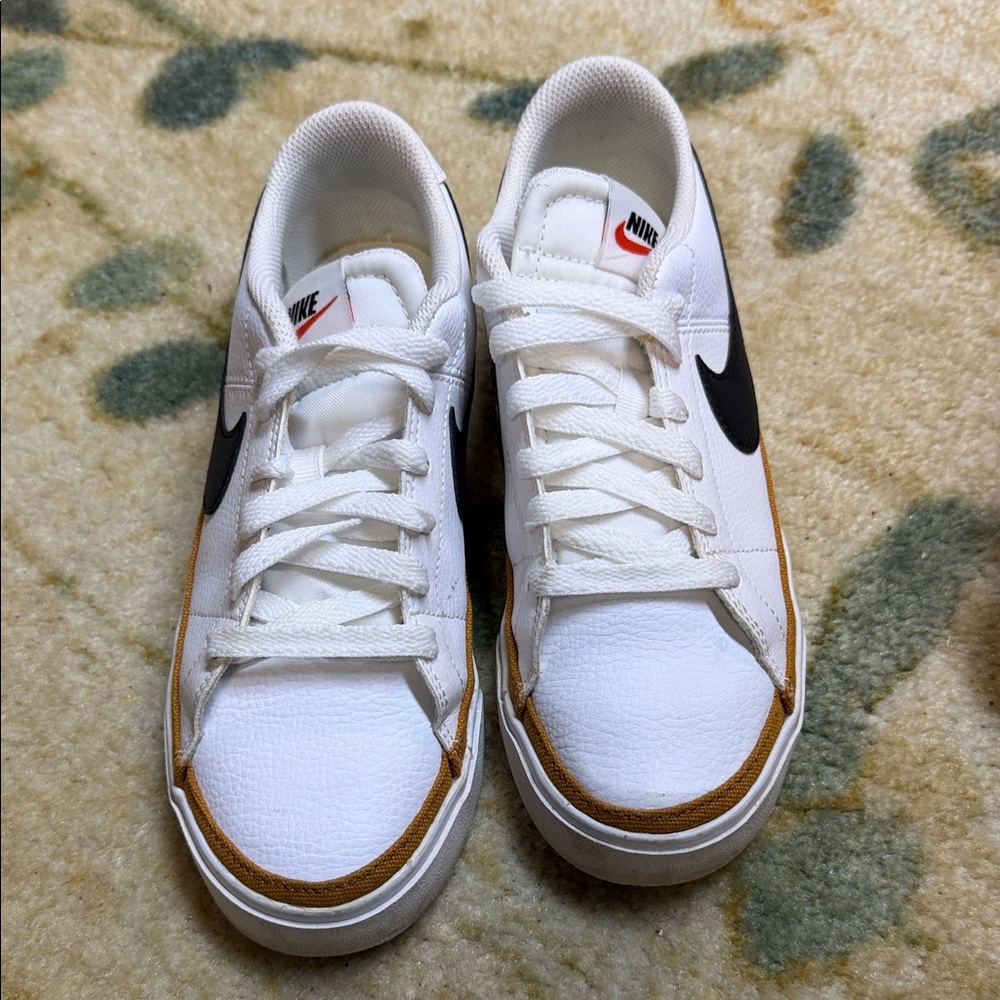 Nike White Sneakers with Black Swoosh and Brown Trim